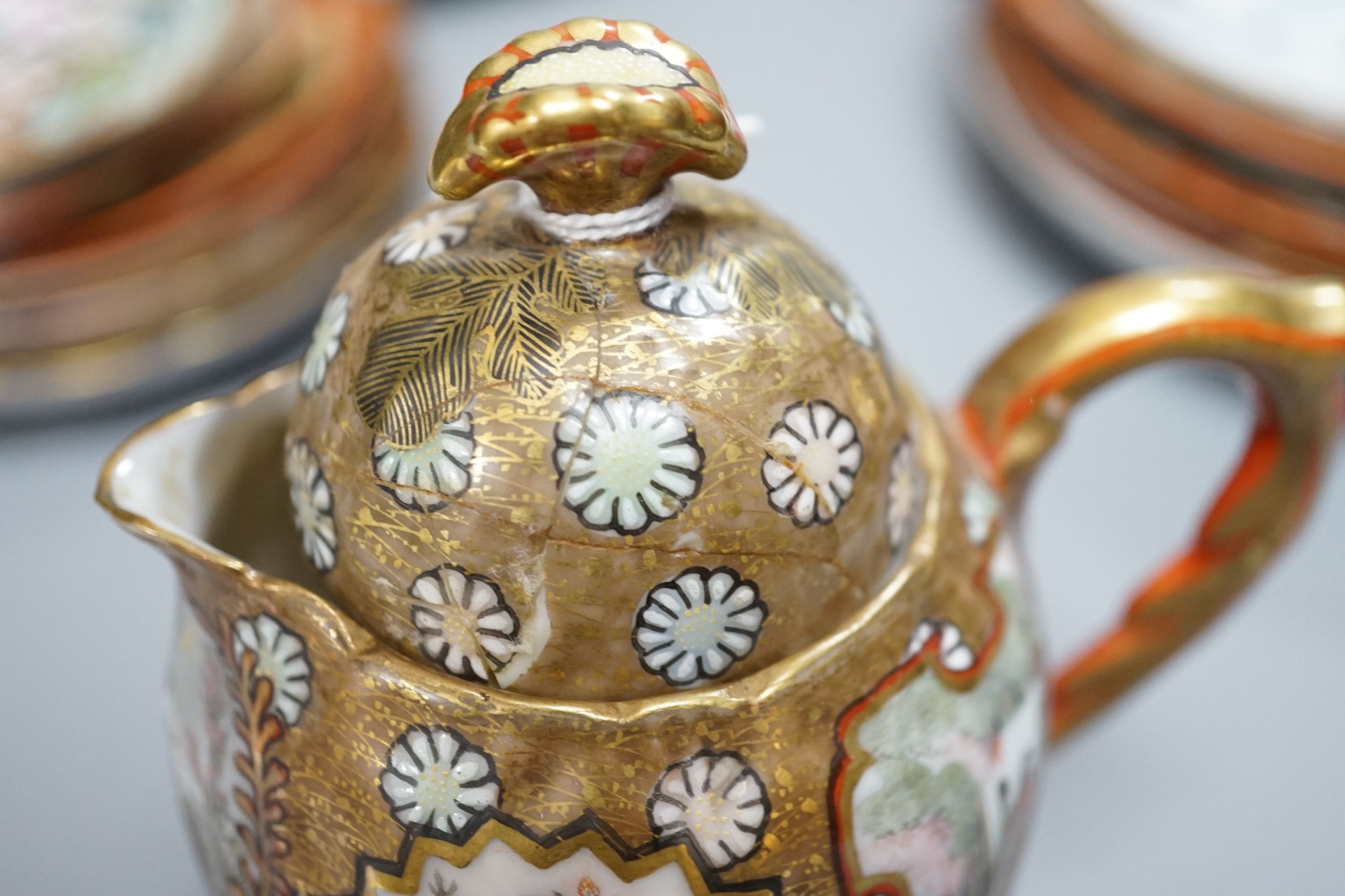 Kutani teawares and a Kutani decorative plate and bowl, Meiji -period, teapot and cover 17 cms high.